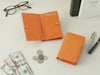 ヴァケッタルクス　外L字ファスナー二つ折り財布　オレンジ